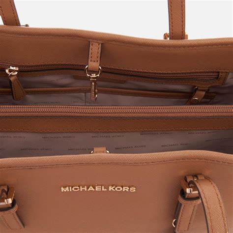 michael kors jet set travel tote large nordstrom|Michael Kors bag with airplanes.